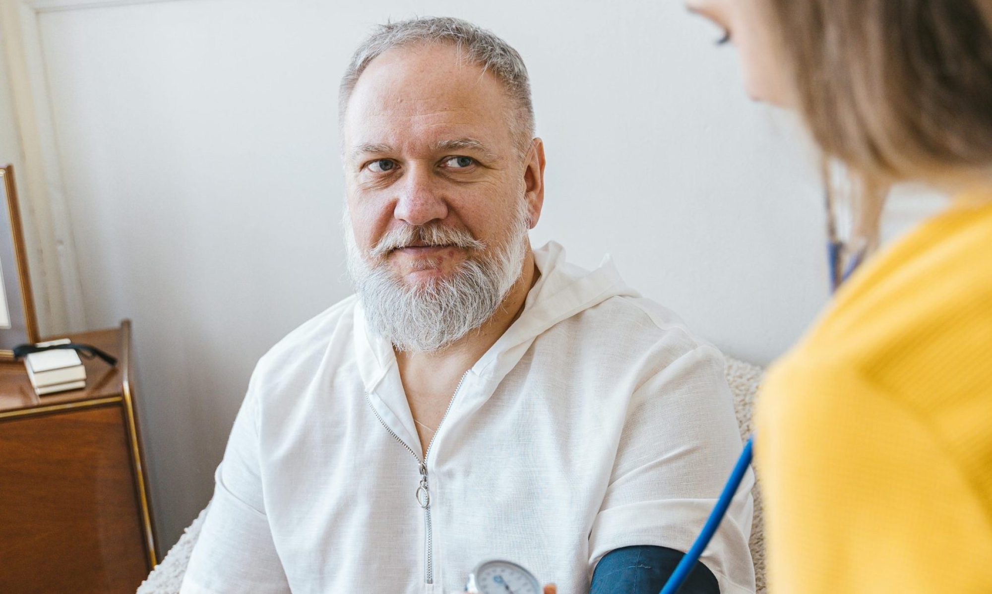 A male patient getting BP Test